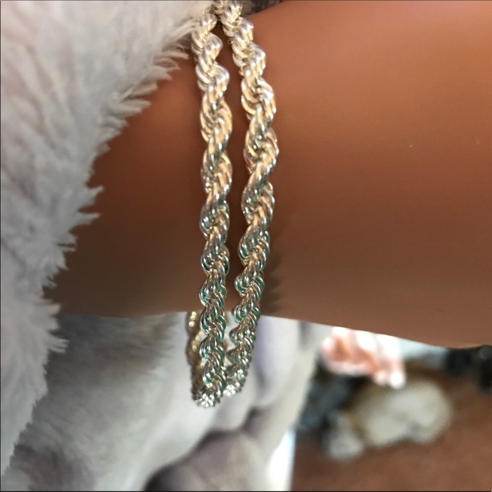 2 Silver Chain Bracelets.